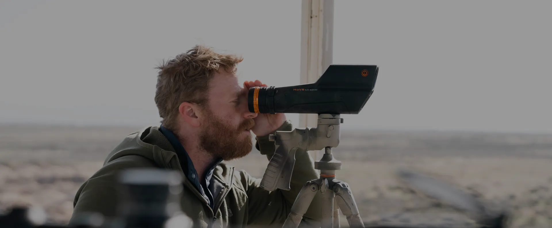 Shooter using a HoVR spotting scope in the field