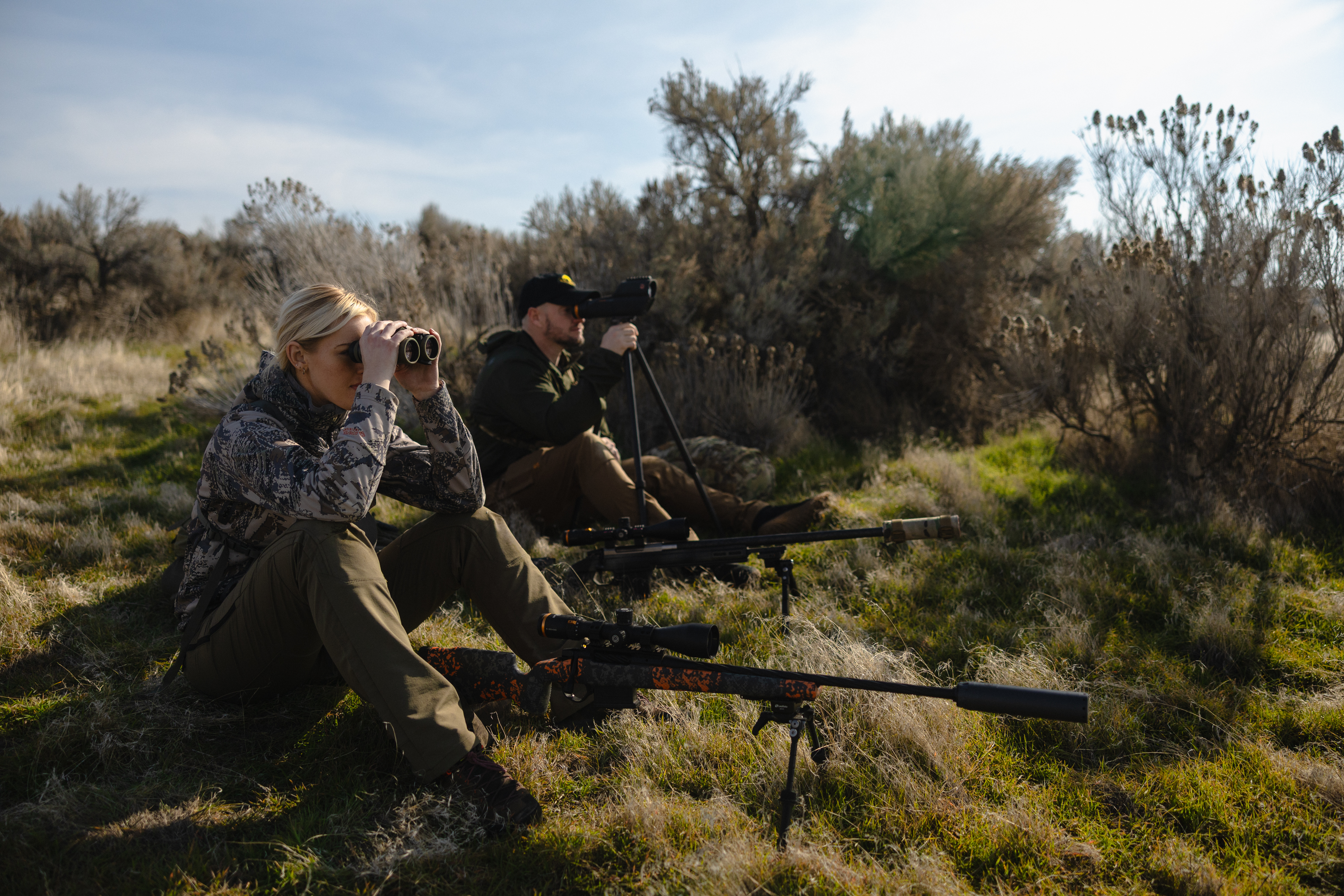 Hunters with Binoculars and a Spotting Scope Hunters with Binoculars and a Spotting Scope