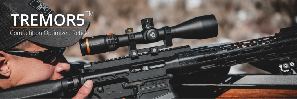 Man shooting a rifle with the TREMOR5 Reticle in the scope